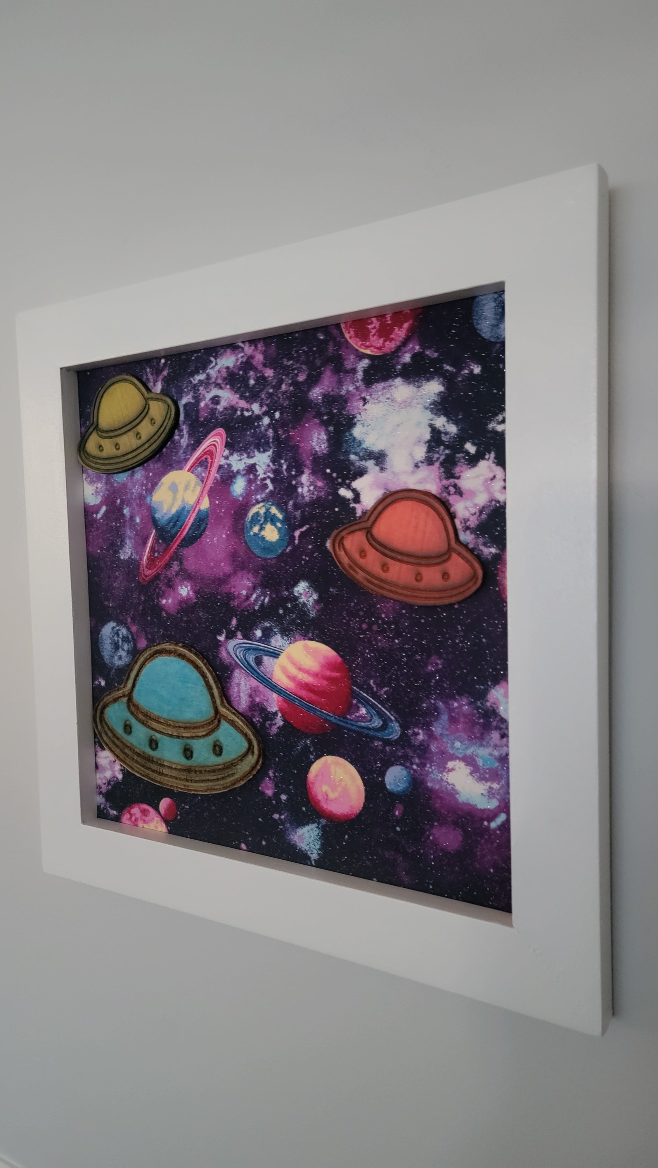Outer Space Wall Art — Glow in the Dark, Hand Painted, Fabric Background, 12x12, White Frame